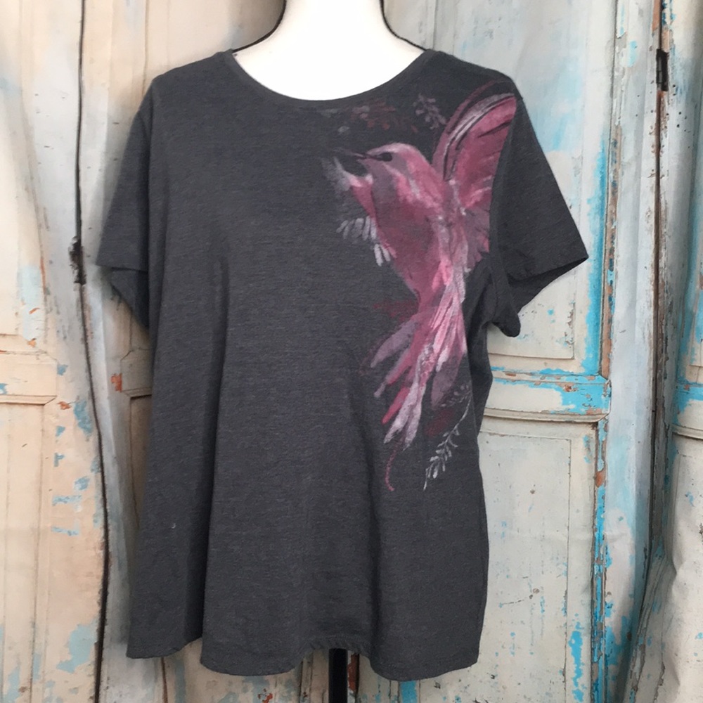 A grey back shirt with a lovely bird on the side